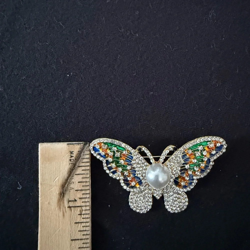 Elegant Multicolor Crystal Butterfly Brooch with Pearl Accent